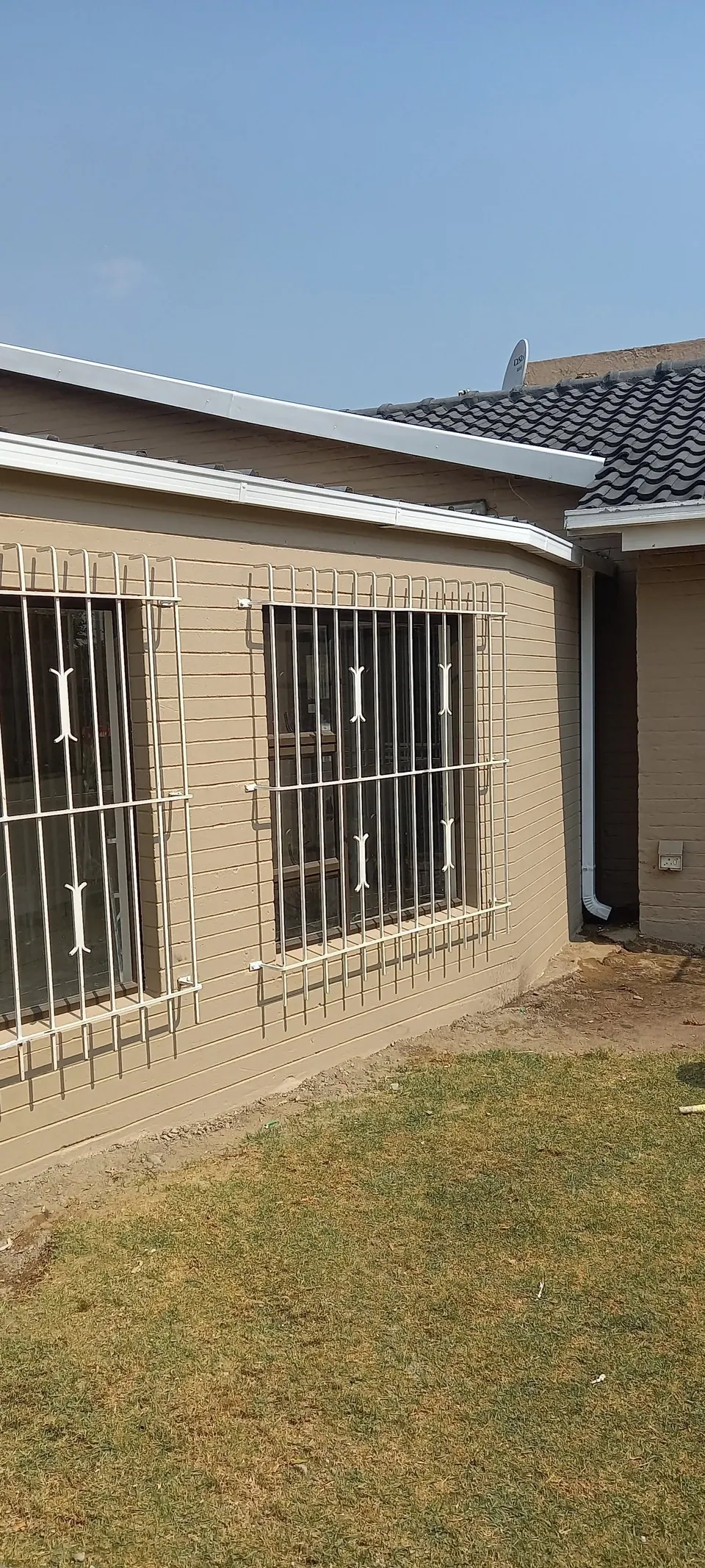 House exterior with barred security windows
