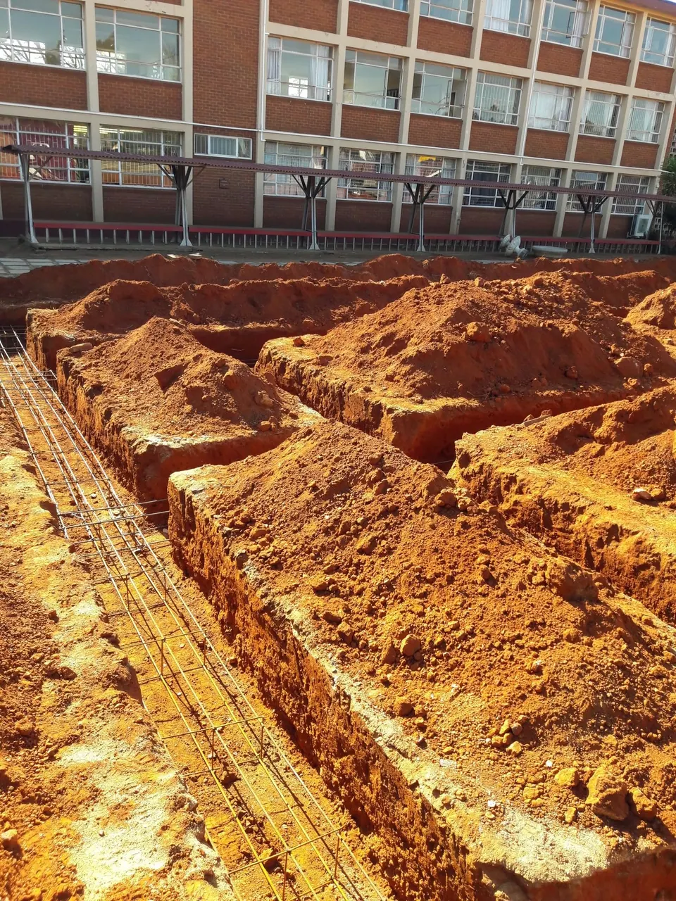 Foundation trenches with reinforcing steel